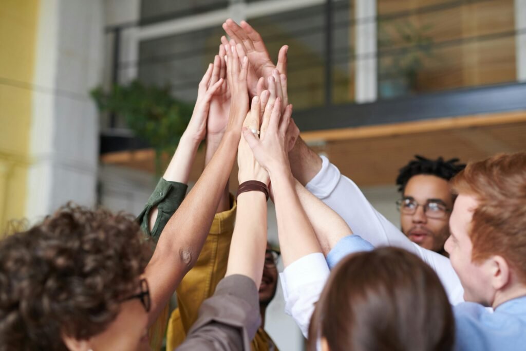 pexels-photo-3184428-3184428 Photo Of People Touching Each Other's Hands